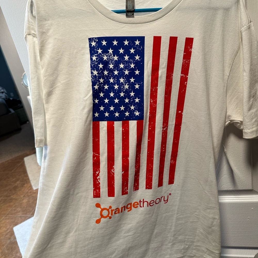 Orangetheory White Tee with Red and Blue Flag Design